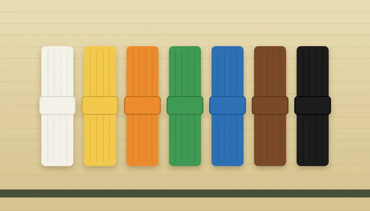 Les ceintures de karaté dans l'ordre : blanche, jaune, orange, verte, bleue, marron et noire